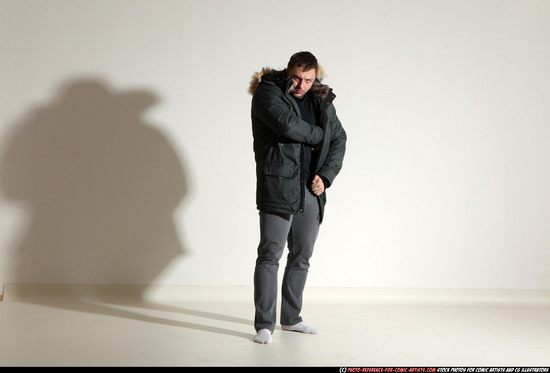 Man Adult Muscular White Fighting with gun Standing poses Casual