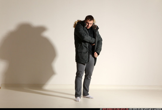 Man Adult Muscular White Fighting with gun Standing poses Casual