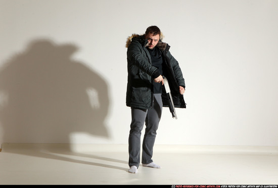 Man Adult Muscular White Fighting with gun Standing poses Casual