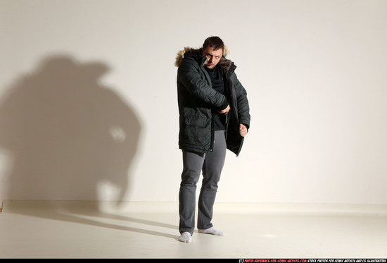 Man Adult Muscular White Fighting with gun Standing poses Casual