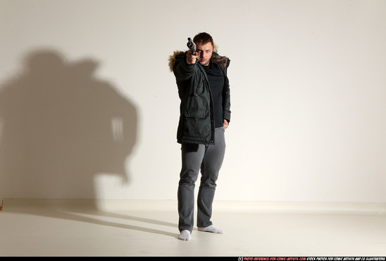 Man Adult Muscular White Fighting with gun Standing poses Casual