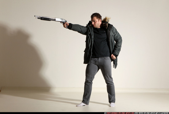 Man Adult Muscular White Fighting with gun Standing poses Casual