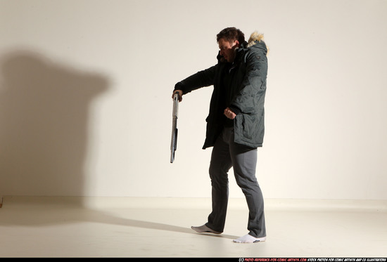 Man Adult Muscular White Fighting with gun Standing poses Casual