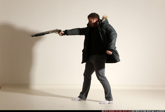 Man Adult Muscular White Fighting with gun Standing poses Casual