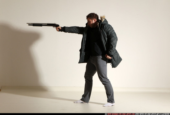 Man Adult Muscular White Fighting with gun Standing poses Casual