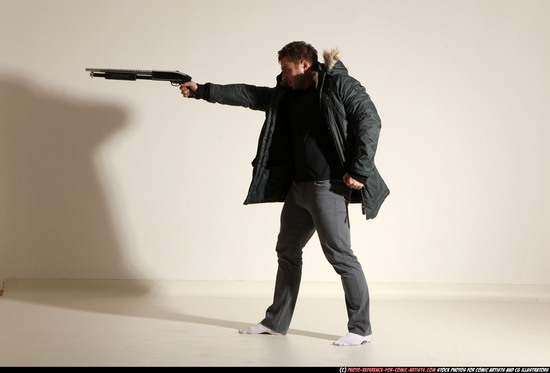Man Adult Muscular White Fighting with gun Standing poses Casual