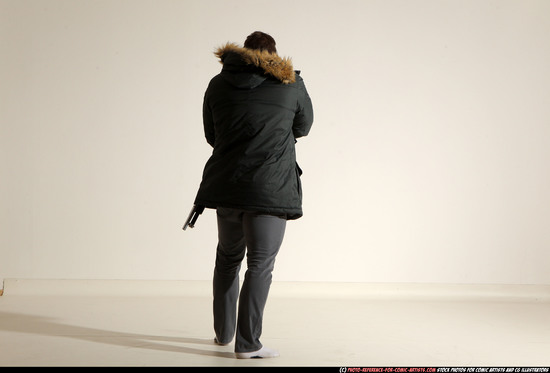 Man Adult Muscular White Fighting with gun Standing poses Casual