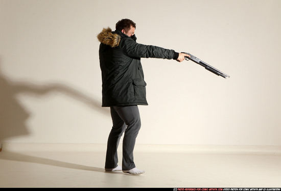 Man Adult Muscular White Fighting with gun Standing poses Casual