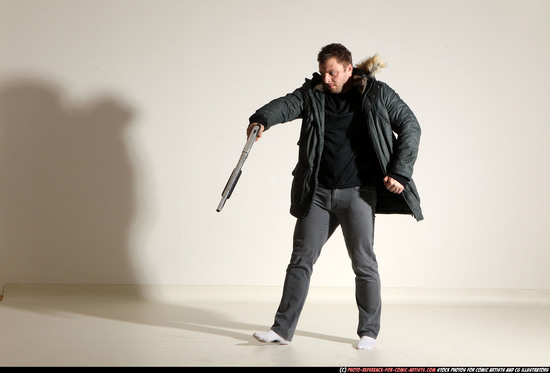 Man Adult Muscular White Fighting with gun Standing poses Casual