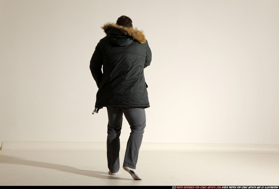 Man Adult Muscular White Fighting with gun Standing poses Casual