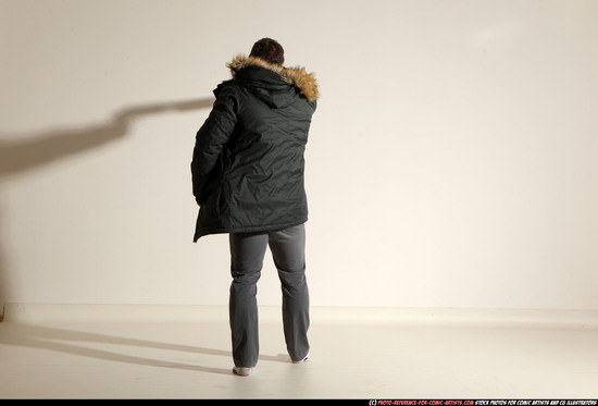 Man Adult Muscular White Fighting with gun Standing poses Casual