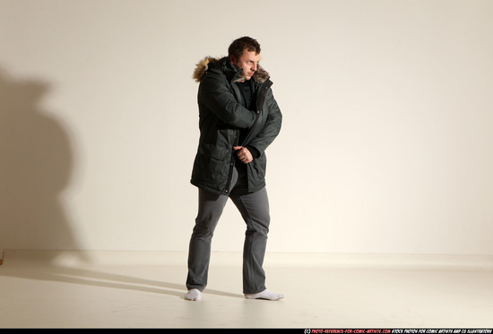 Man Adult Muscular White Fighting with gun Standing poses Casual