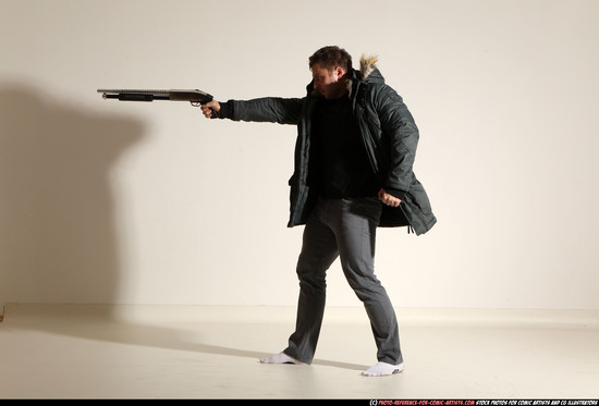 Man Adult Muscular White Fighting with gun Standing poses Casual