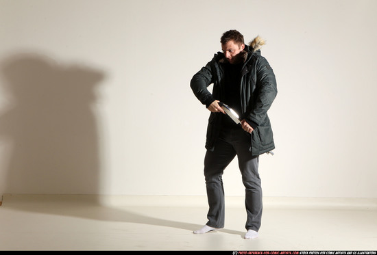 Man Adult Muscular White Fighting with gun Standing poses Casual