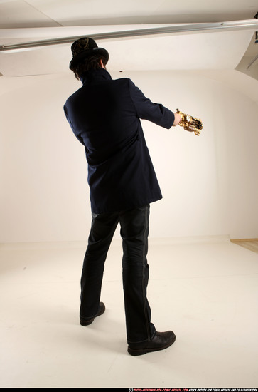 Man Old Average White Fighting with gun Standing poses Coat