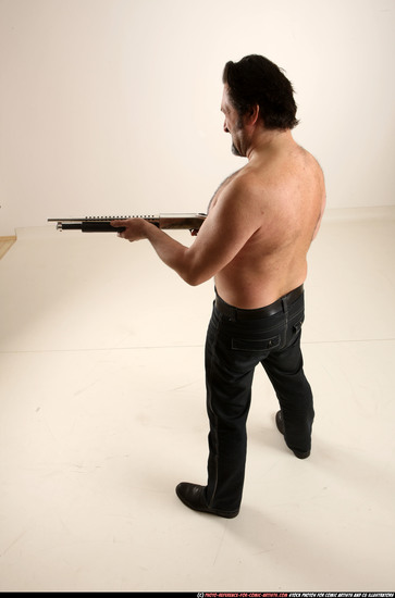 Man Old Average White Standing poses Pants Fighting with shotgun