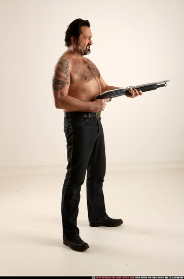 Man Old Average White Standing poses Pants Fighting with shotgun