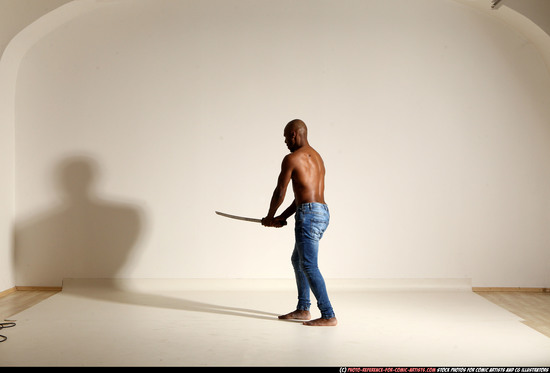 Man Adult Athletic Black Fighting with sword Moving poses Pants