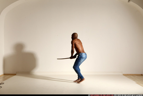 Man Adult Athletic Black Fighting with sword Moving poses Pants