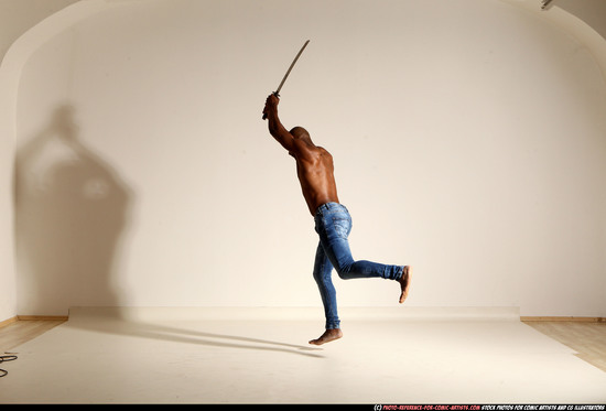 Man Adult Athletic Black Fighting with sword Moving poses Pants