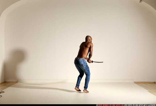 Man Adult Athletic Black Fighting with sword Moving poses Pants