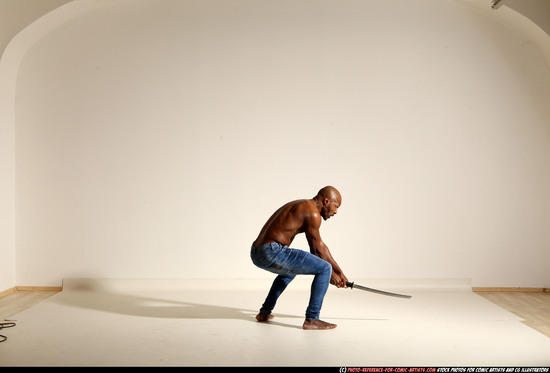 Man Adult Athletic Black Fighting with sword Moving poses Pants