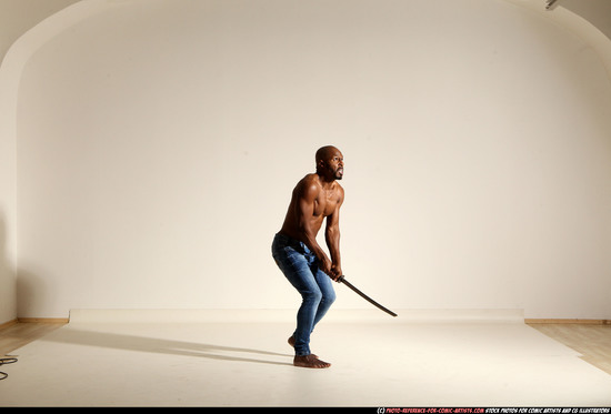 Man Adult Athletic Black Fighting with sword Moving poses Pants