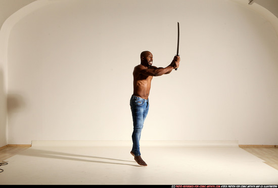 Man Adult Athletic Black Fighting with sword Moving poses Pants