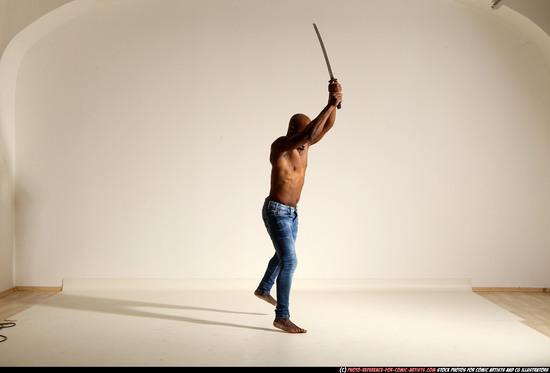 Man Adult Athletic Black Fighting with sword Moving poses Pants