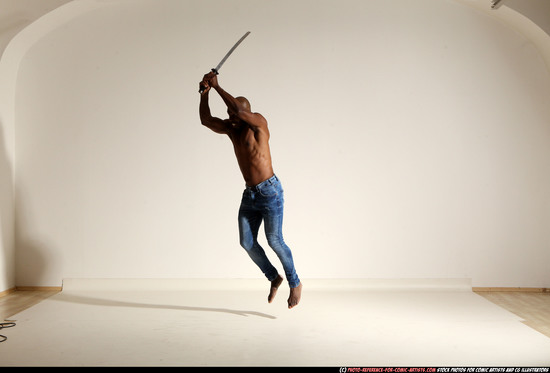 Man Adult Athletic Black Fighting with sword Moving poses Pants