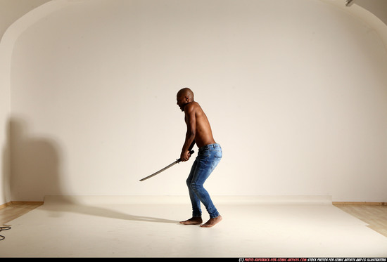 Man Adult Athletic Black Fighting with sword Moving poses Pants