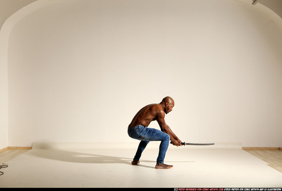 Man Adult Athletic Black Fighting with sword Moving poses Pants