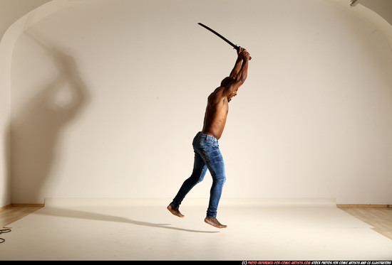 Man Adult Athletic Black Fighting with sword Moving poses Pants