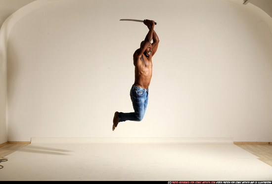 Man Adult Athletic Black Fighting with sword Moving poses Pants