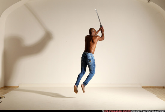 Man Adult Athletic Black Fighting with sword Moving poses Pants