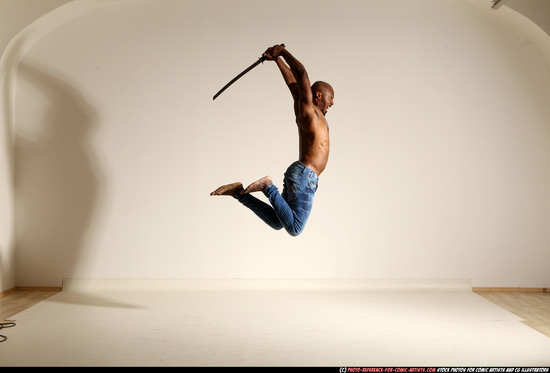 Man Adult Athletic Black Fighting with sword Moving poses Pants