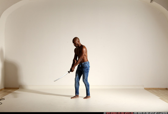 Man Adult Athletic Black Fighting with sword Moving poses Pants