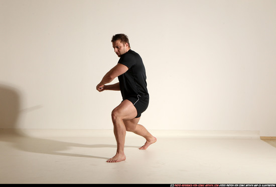 Man Adult Muscular White Fighting with sword Kneeling poses Sportswear