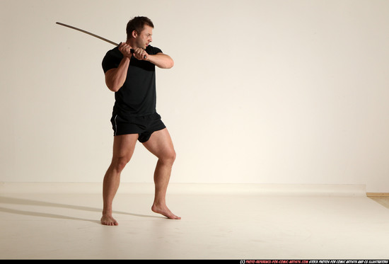 Man Adult Muscular White Fighting with sword Kneeling poses Sportswear