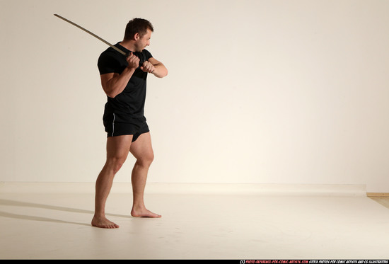 Man Adult Muscular White Fighting with sword Kneeling poses Sportswear