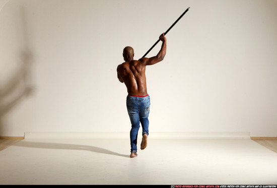 Man Adult Athletic Black Fighting with spear Moving poses Pants