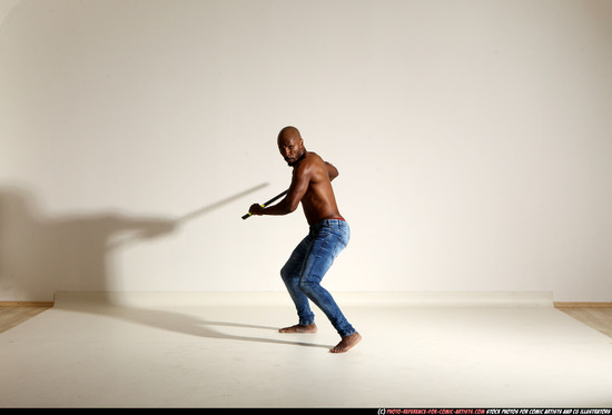 Man Adult Athletic Black Fighting with spear Moving poses Pants