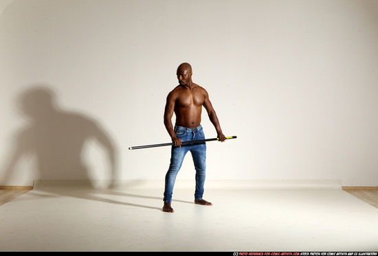 Man Adult Athletic Black Fighting with spear Moving poses Pants