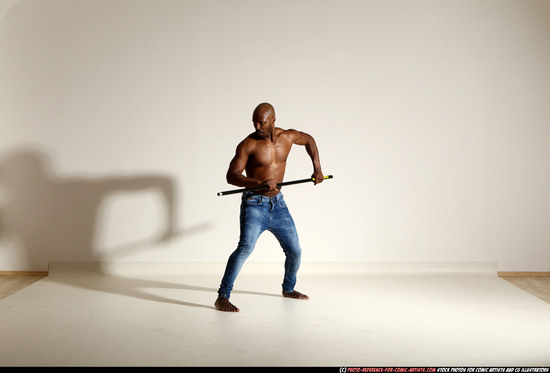 Man Adult Athletic Black Fighting with spear Moving poses Pants