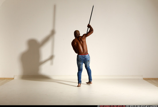 Man Adult Athletic Black Fighting with spear Moving poses Pants