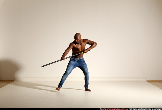 Man Adult Athletic Black Fighting with spear Moving poses Pants