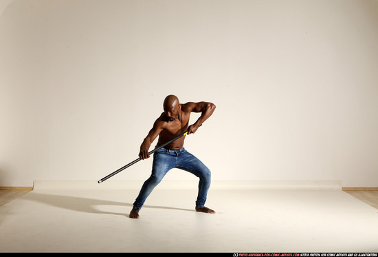 Man Adult Athletic Black Fighting with spear Moving poses Pants