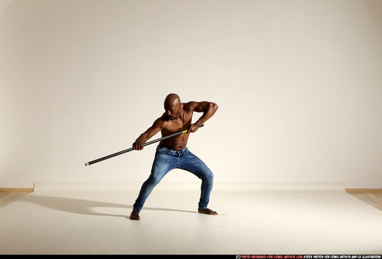 Man Adult Athletic Black Fighting with spear Moving poses Pants