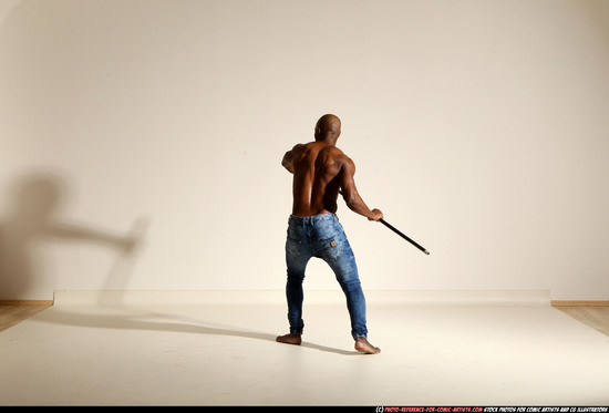 Man Adult Athletic Black Fighting with spear Moving poses Pants