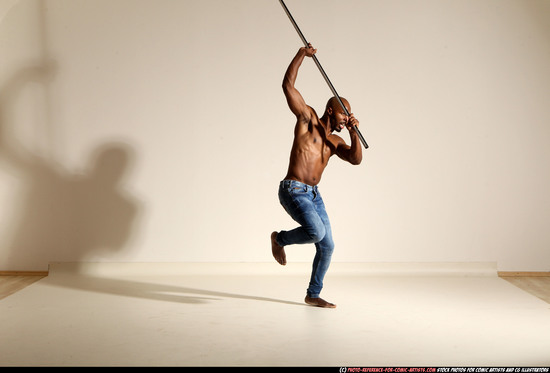 Man Adult Athletic Black Fighting with spear Moving poses Pants